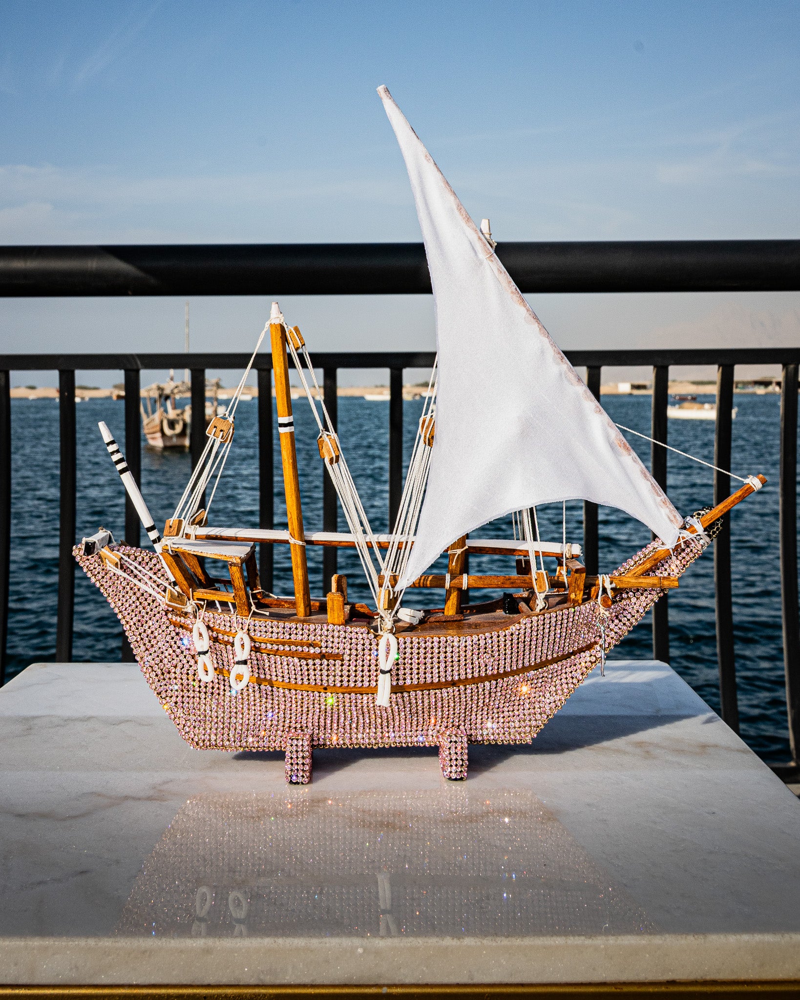 Traditional dhow boat, jeweled pink