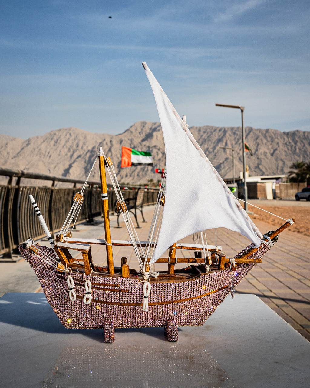 Traditional dhow boat, jeweled pink